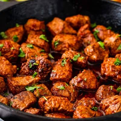 Easy Spicy Chipotle Steak Bites in a cast iron skillet.