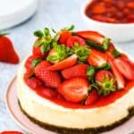 eggless cheesecake made in the instant pot topped with strawberry sauce