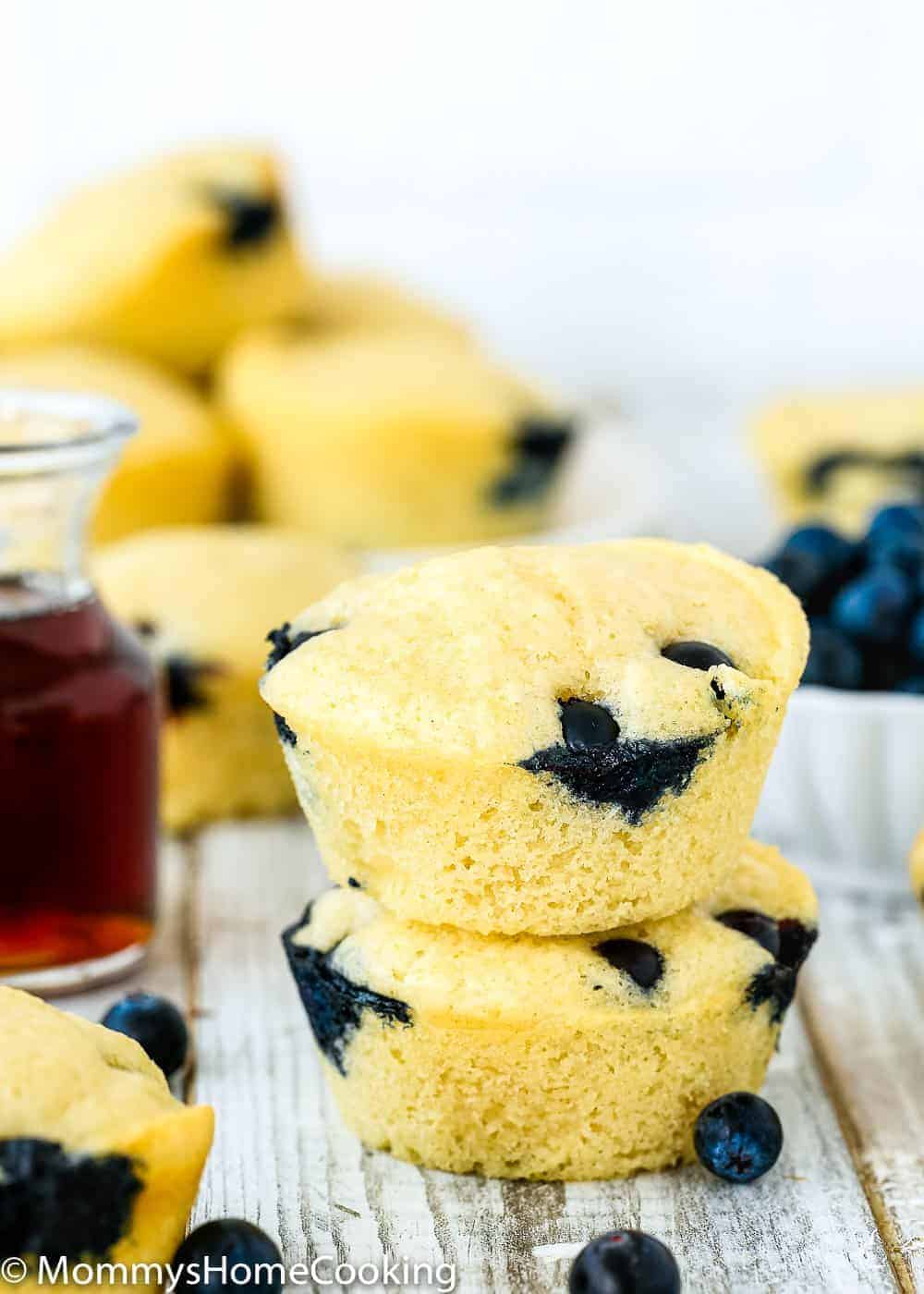 Eggless Blueberry Pancake Muffins over a wooden table 