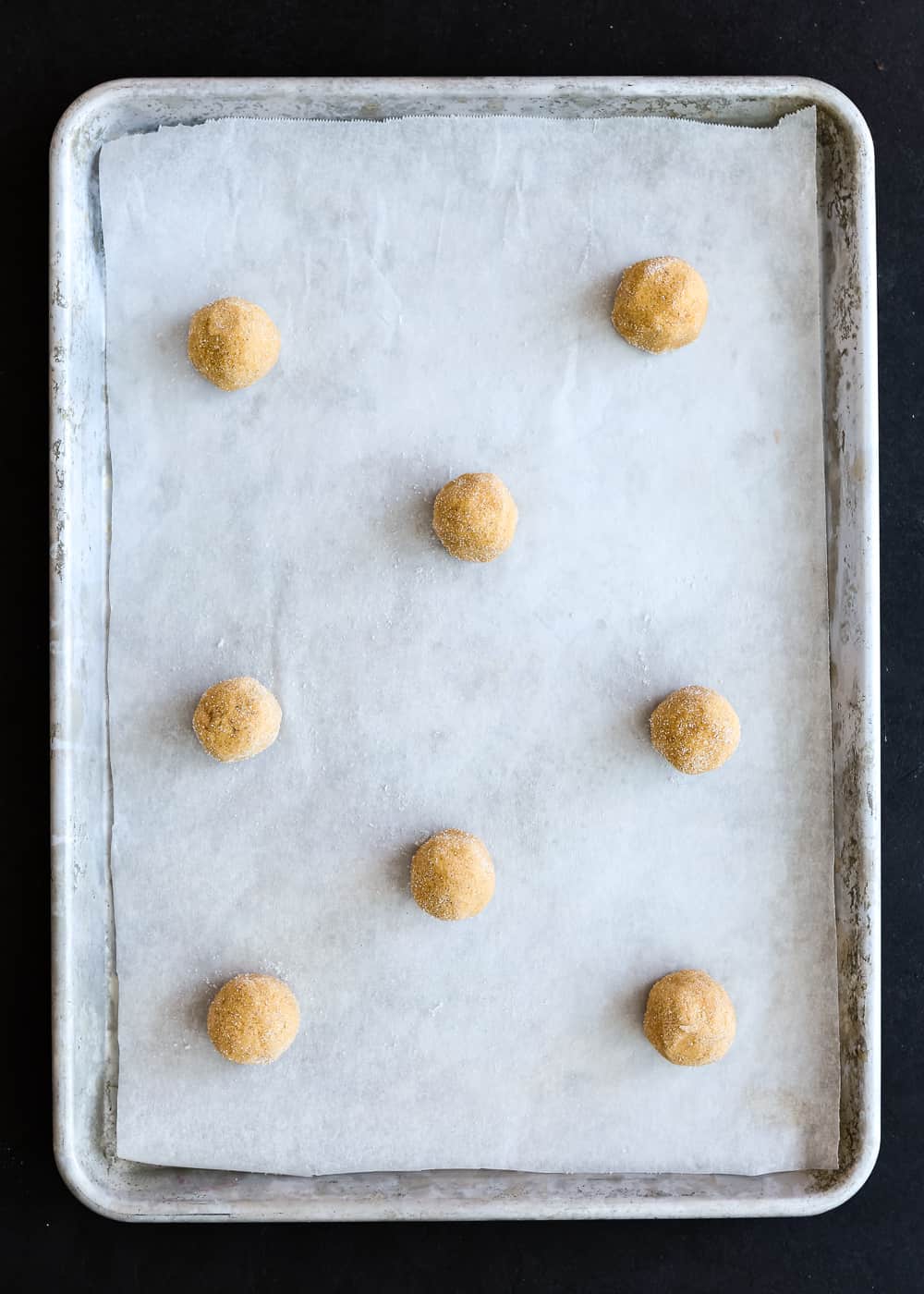 Eggless Pumpkin Snickerdoodles Dough balls in a cookie sheet