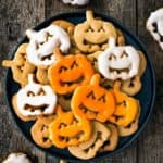 Eggless Halloween Cookies in a plate with glaze