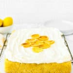 Eggless Lemon Cake with lemon butter cream on a cooling rack