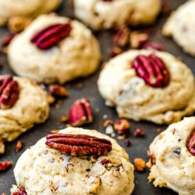 Eggless Butter Pecan Cookies over a slate surface