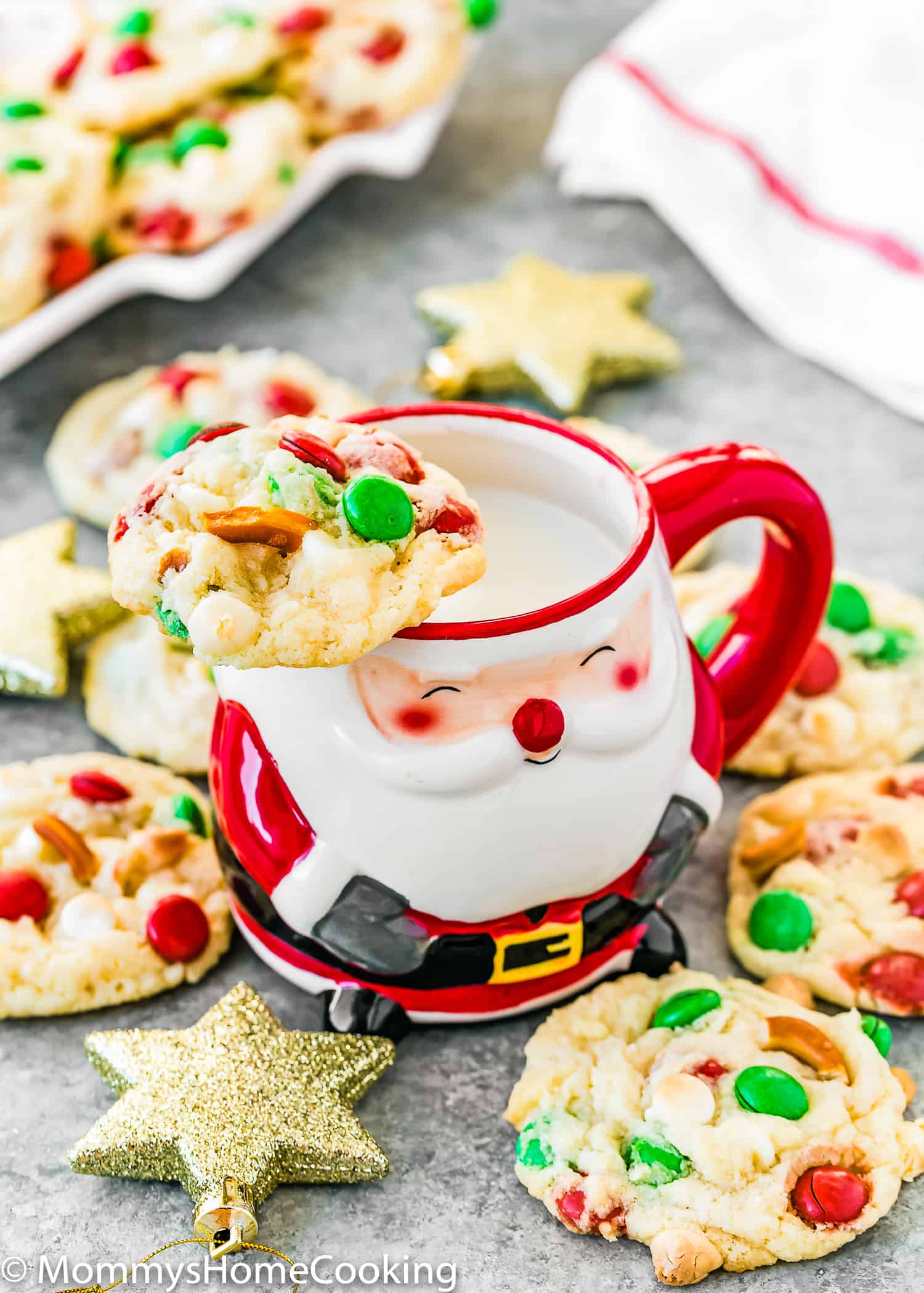 Eggless Christmas Cookies with a santa cup filled with milk