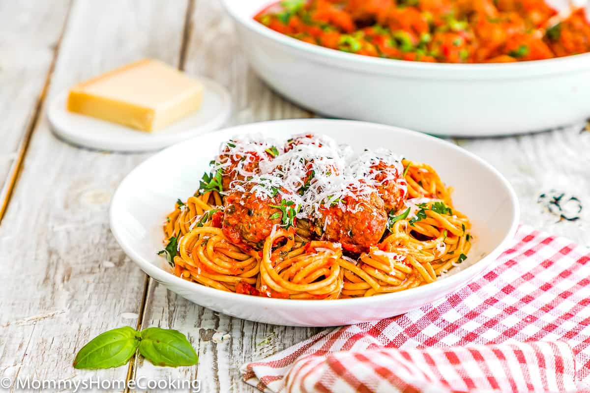 a plate of the BEST Eggless Italian Meatballs and pasta