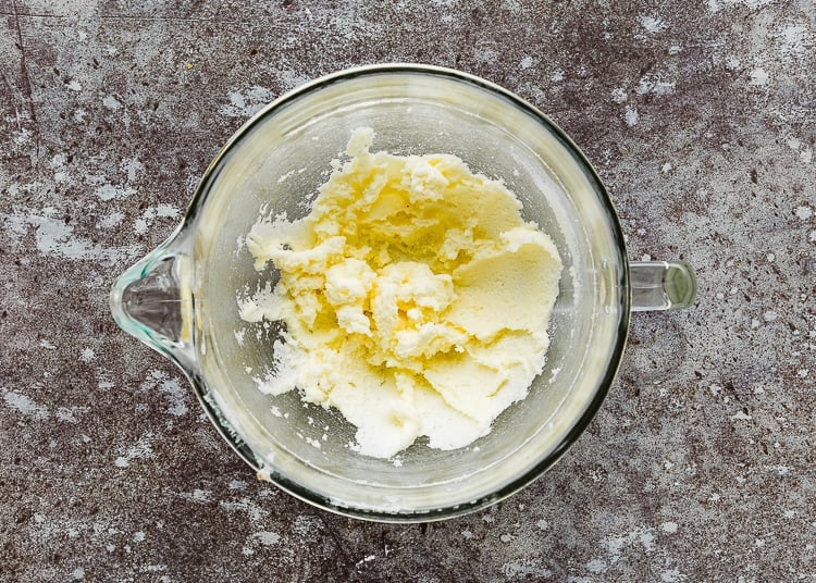 butter, granulated sugar and vanilla extract beaten together in a bowl. 