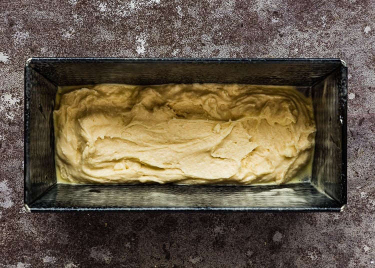eggless vanilla cake batter in a loaf pan. 