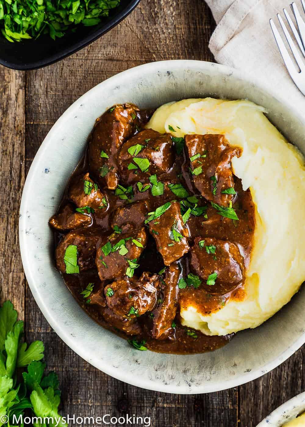  Beef with Gravy and mashed potatoes in a bowl