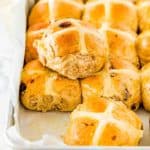 Eggless Easter Hot Cross Buns in a baking pan
