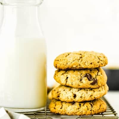 stack of Eggless Oatmeal Cookies with a glass of milk