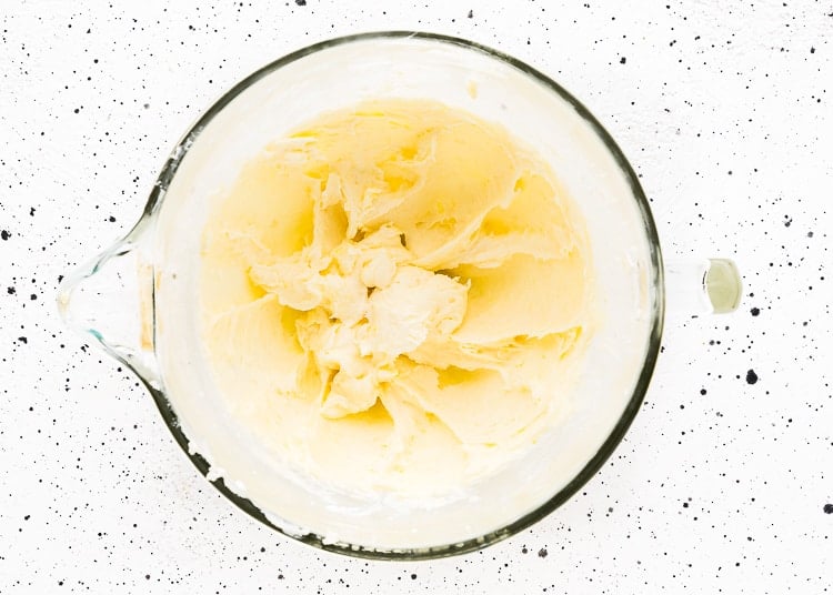 butter and sugar creamed together in a mixing bowl. 