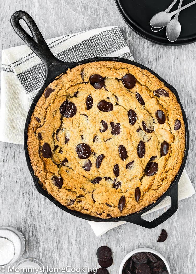 Eggless Chocolate Chip Skillet Cookie over a gray surface 