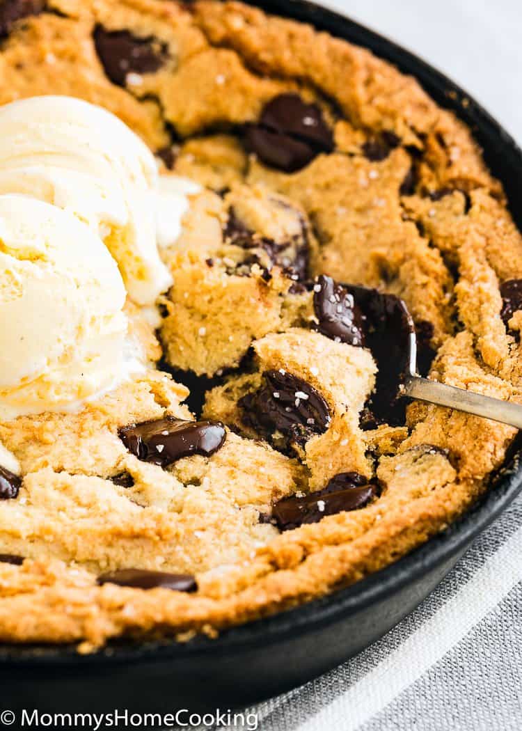 Eggless Chocolate Chip Skillet Cookie with a spoon
