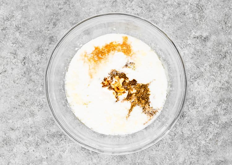 buttermilk, sour cream, vanilla and coffee in a bowl. 