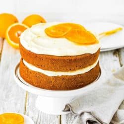Easy Eggless Orange Cake on cake stand