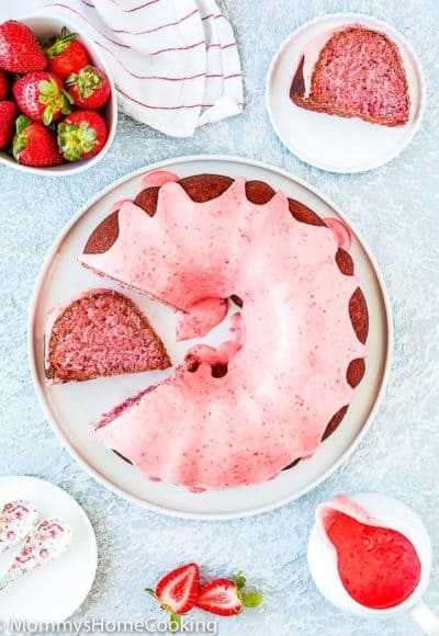 sliced Eggless Homemade Strawberry Bundt Cake with fresh strawberry glaze