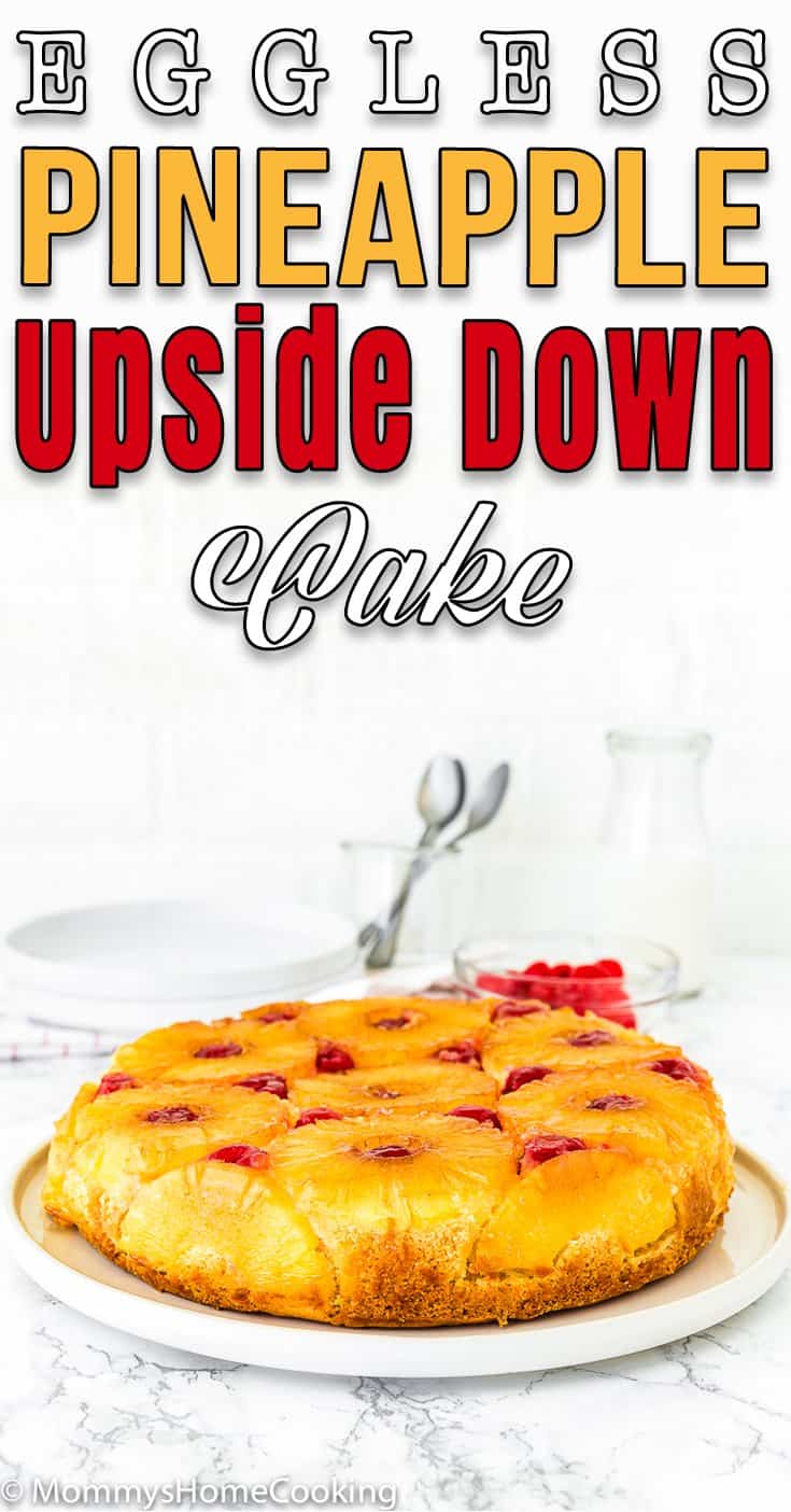 a whole Eggless Pineapple Upside Down Cake over a cake plate with text overlay