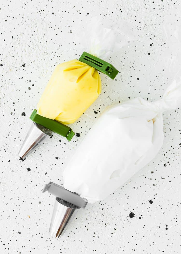Piping bag with egg-free lemon curl and egg-free meringue. 