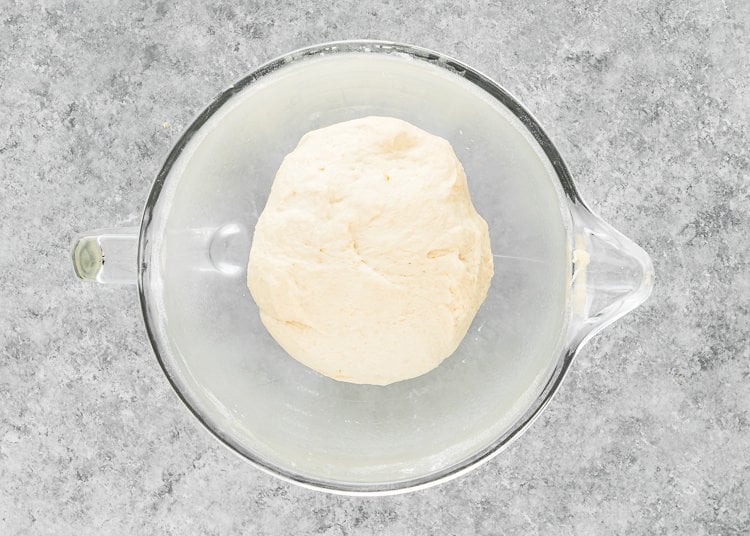 egg-free Hawaiian rolls dough in a stand mixer bowl. 
