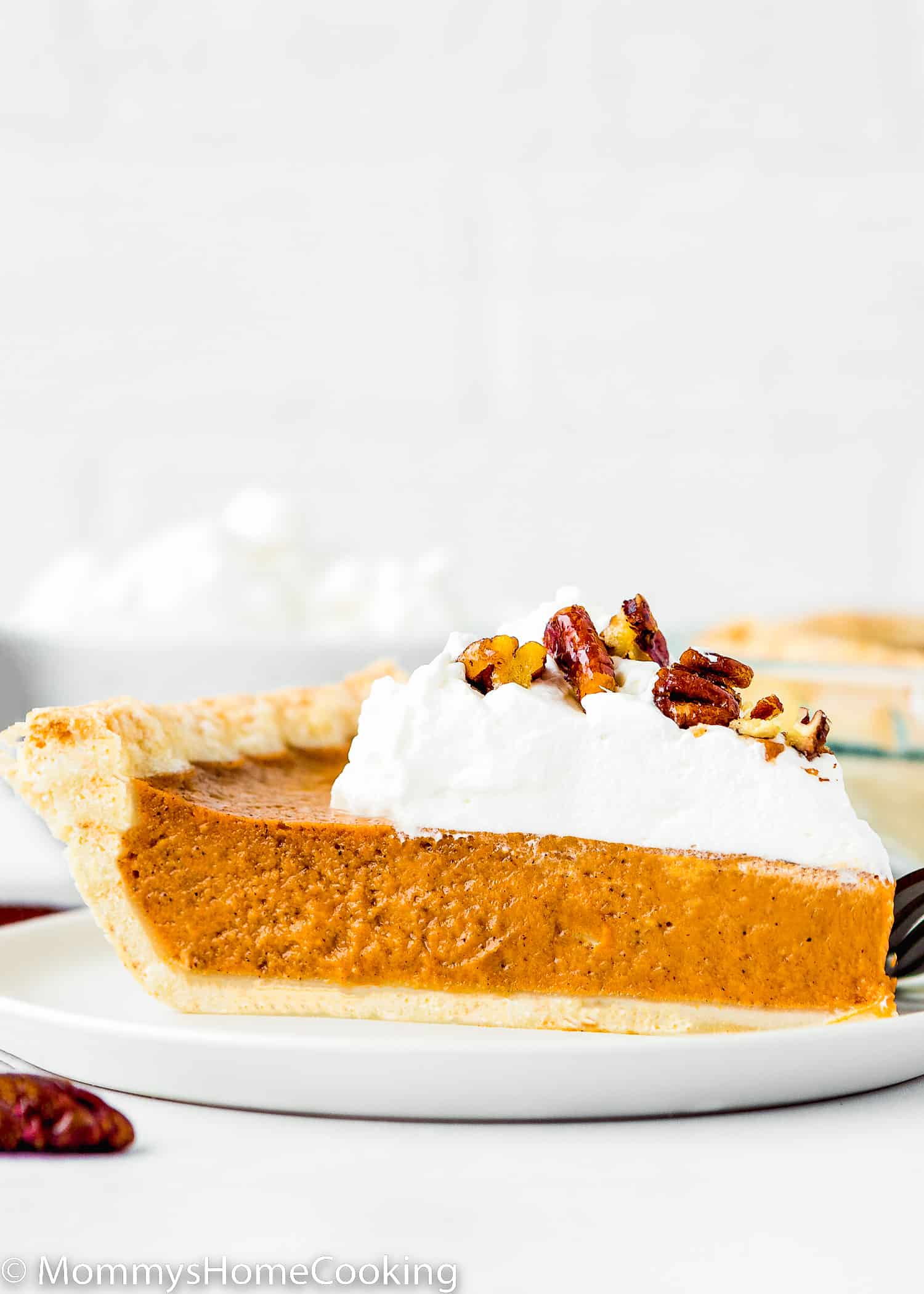 slice of egg-free sweet potato pie on a plate.