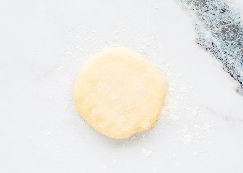 Pie dough onto a lightly floured surface.