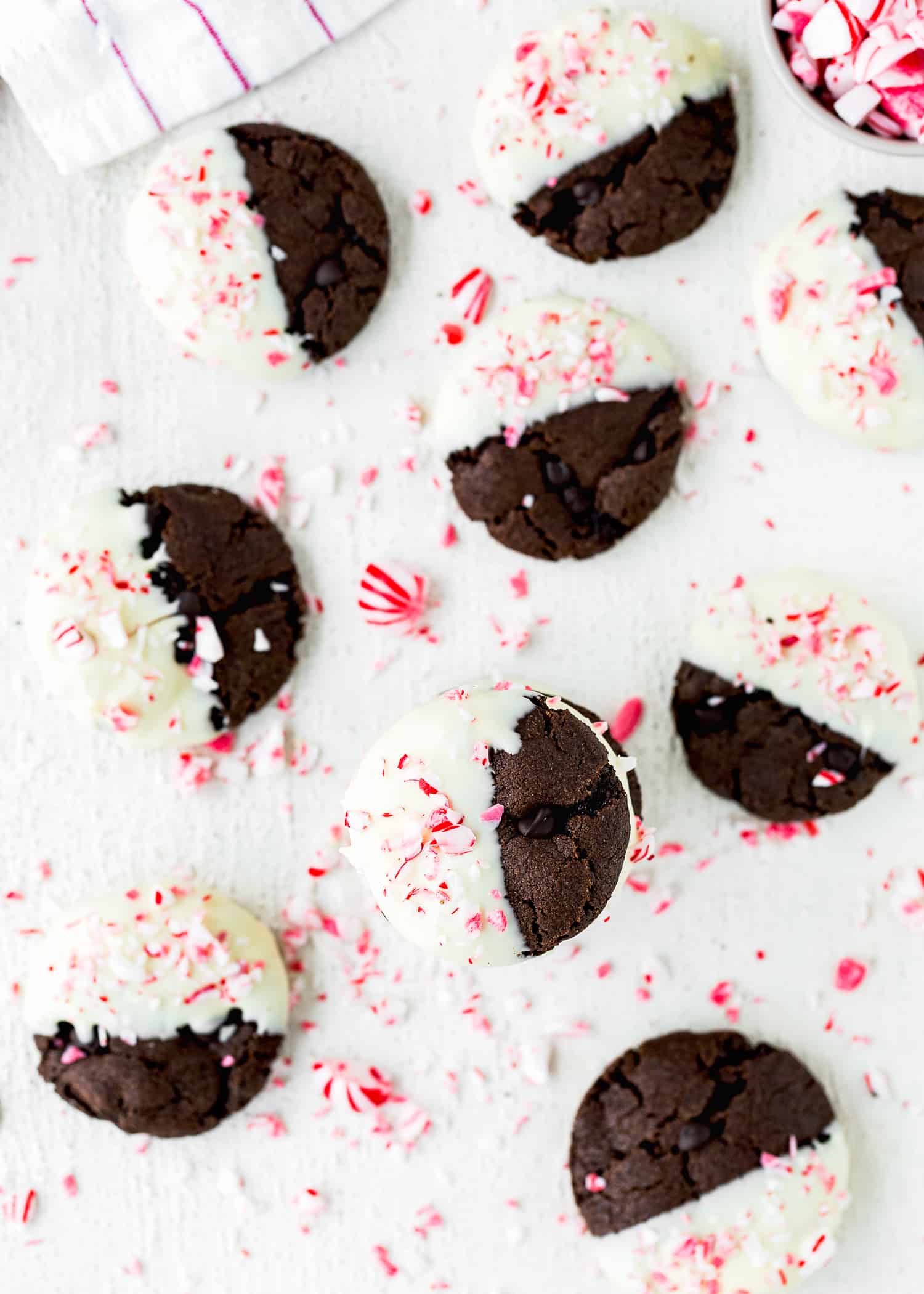 overhead view of Eggless Triple Chocolate Peppermint Cookies with crushed peppermint candies.
