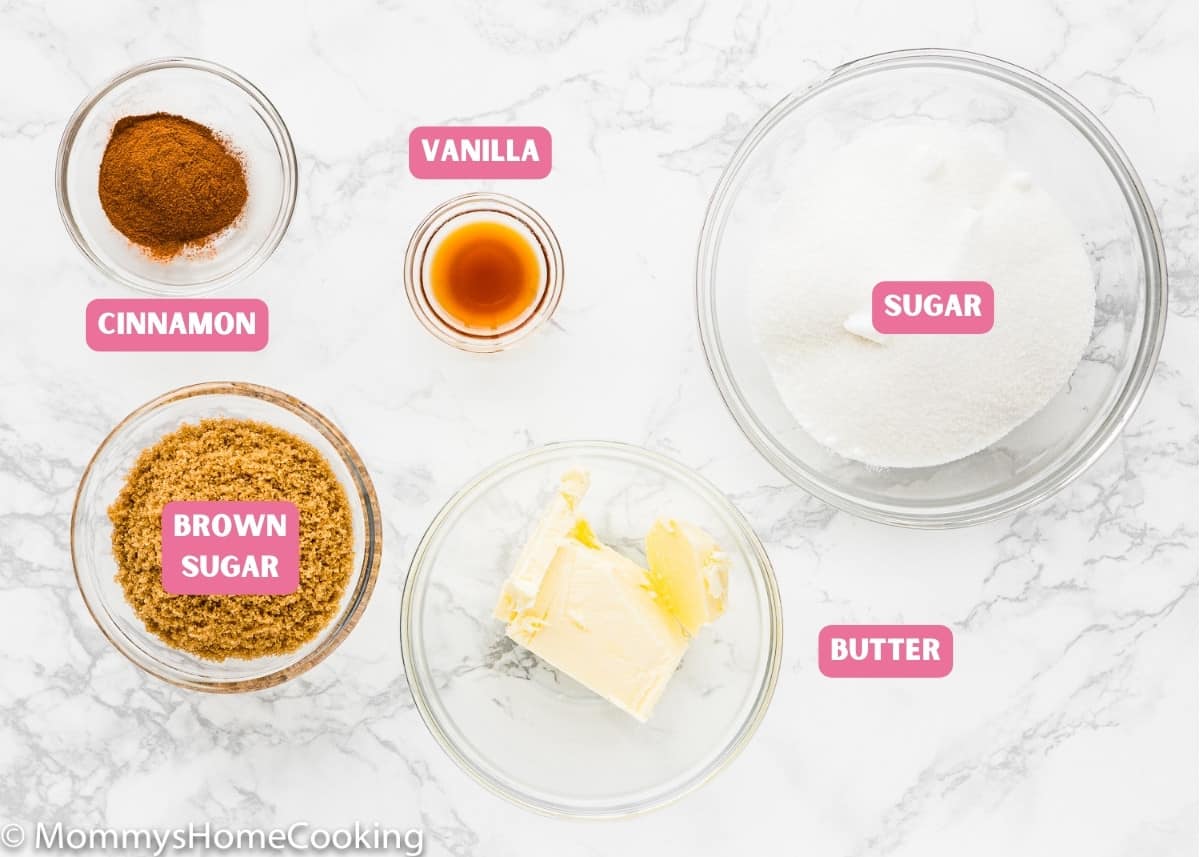 egg-free monkey bread coating ingredients with name tags over a marble surface.