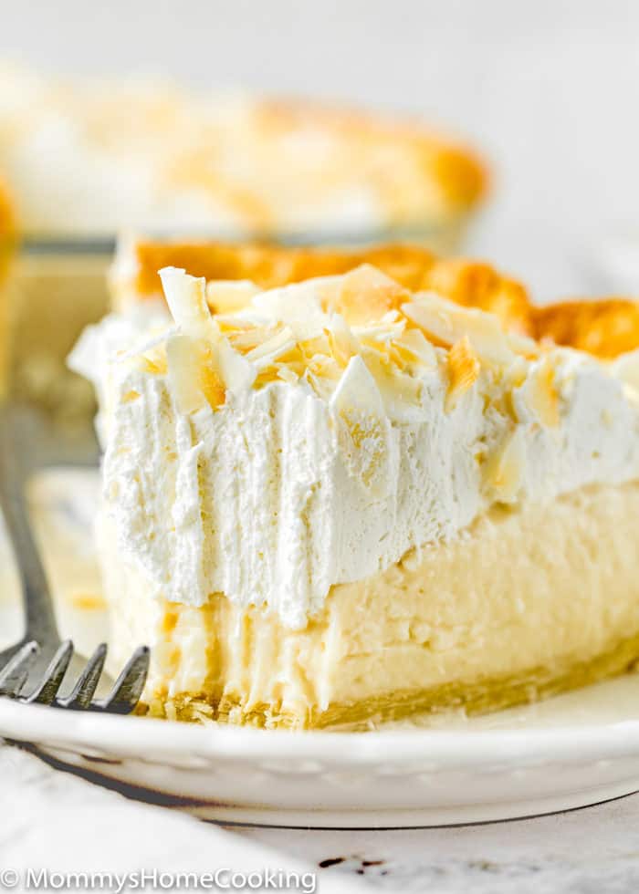 Eggless Coconut Cream Pie slice on a plate showing creamy texture