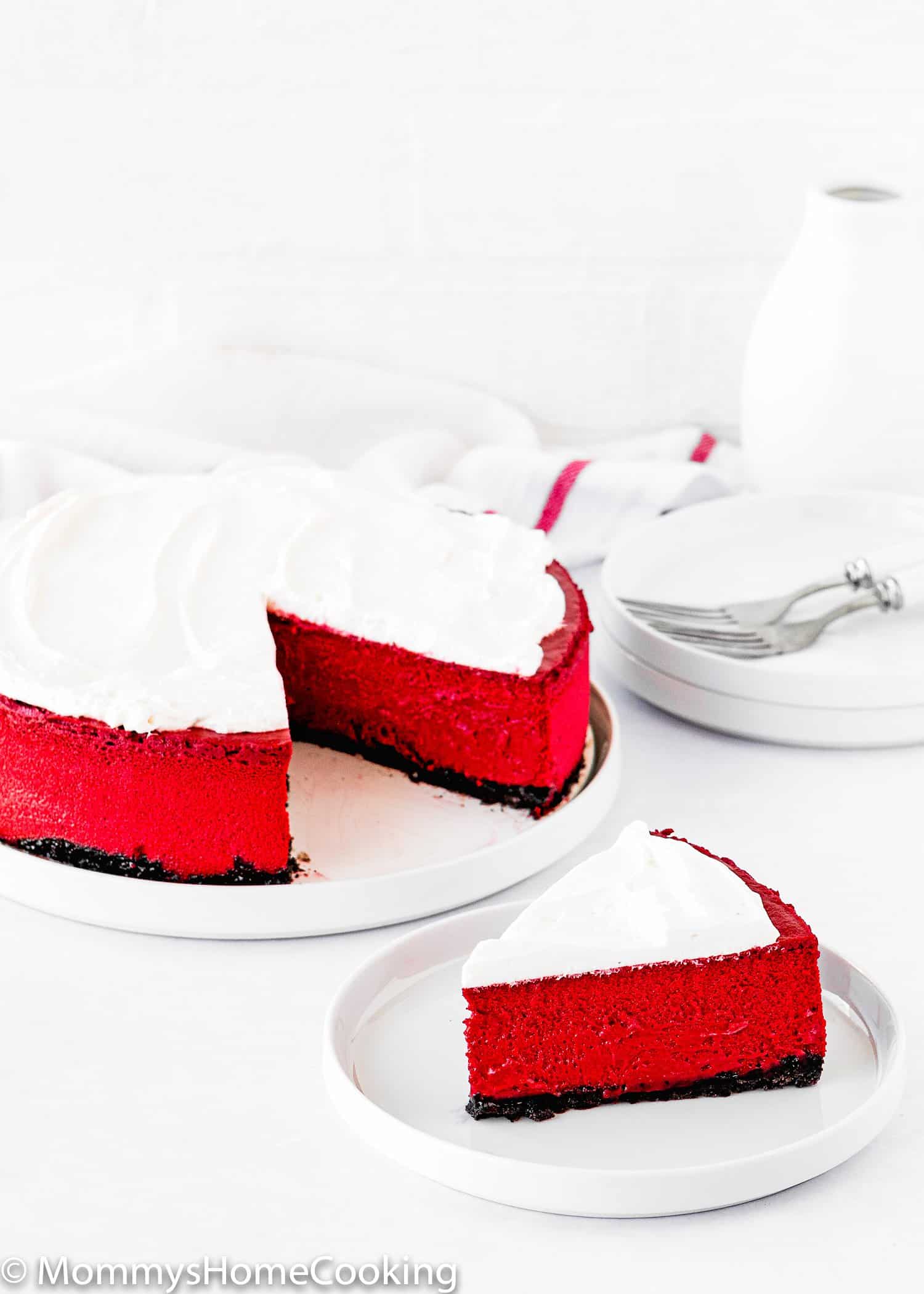 sliced Eggless Red Velvet Cheesecake on a plate.