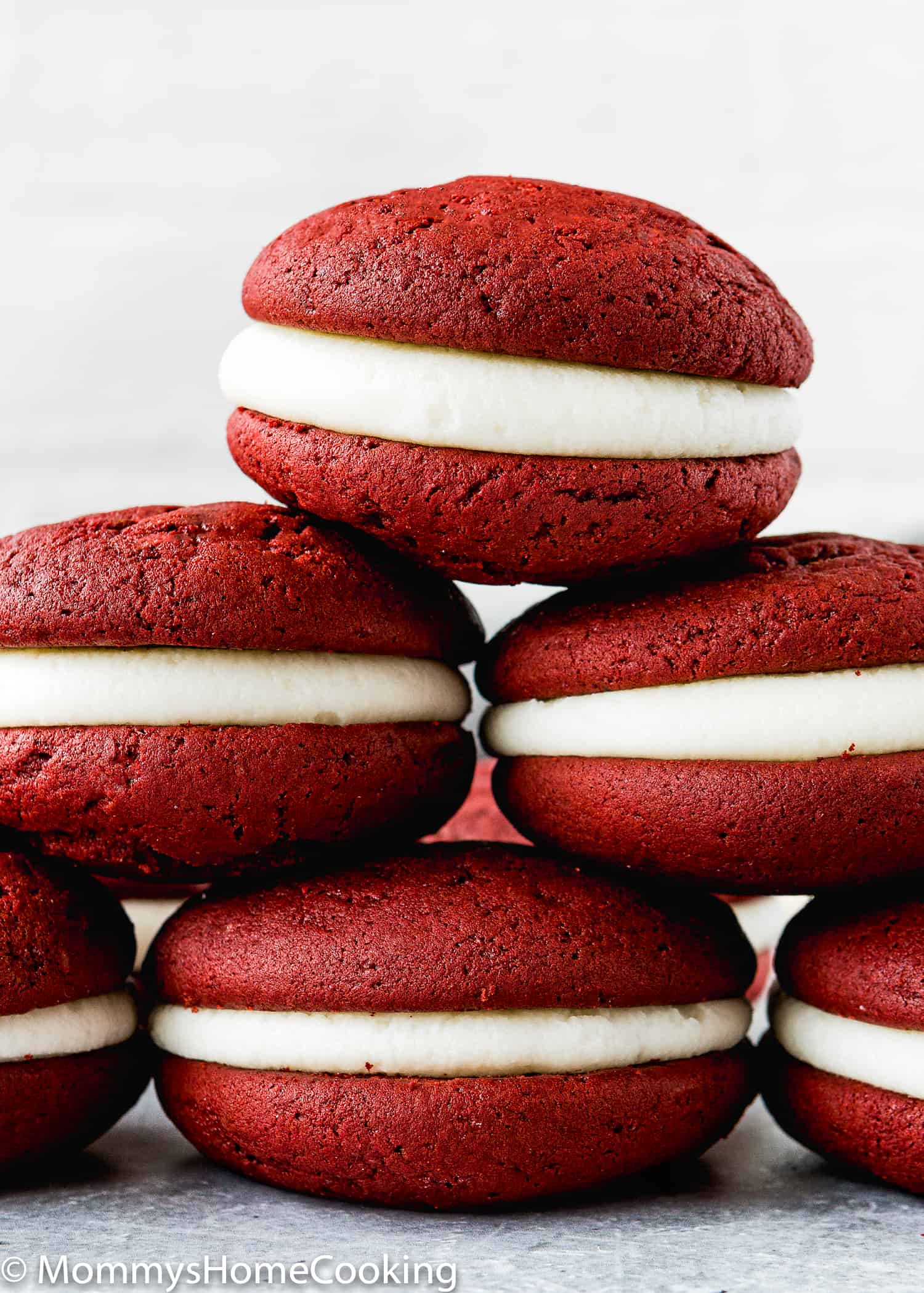 Eggless Red Velvet Whoopie Pies piled up.