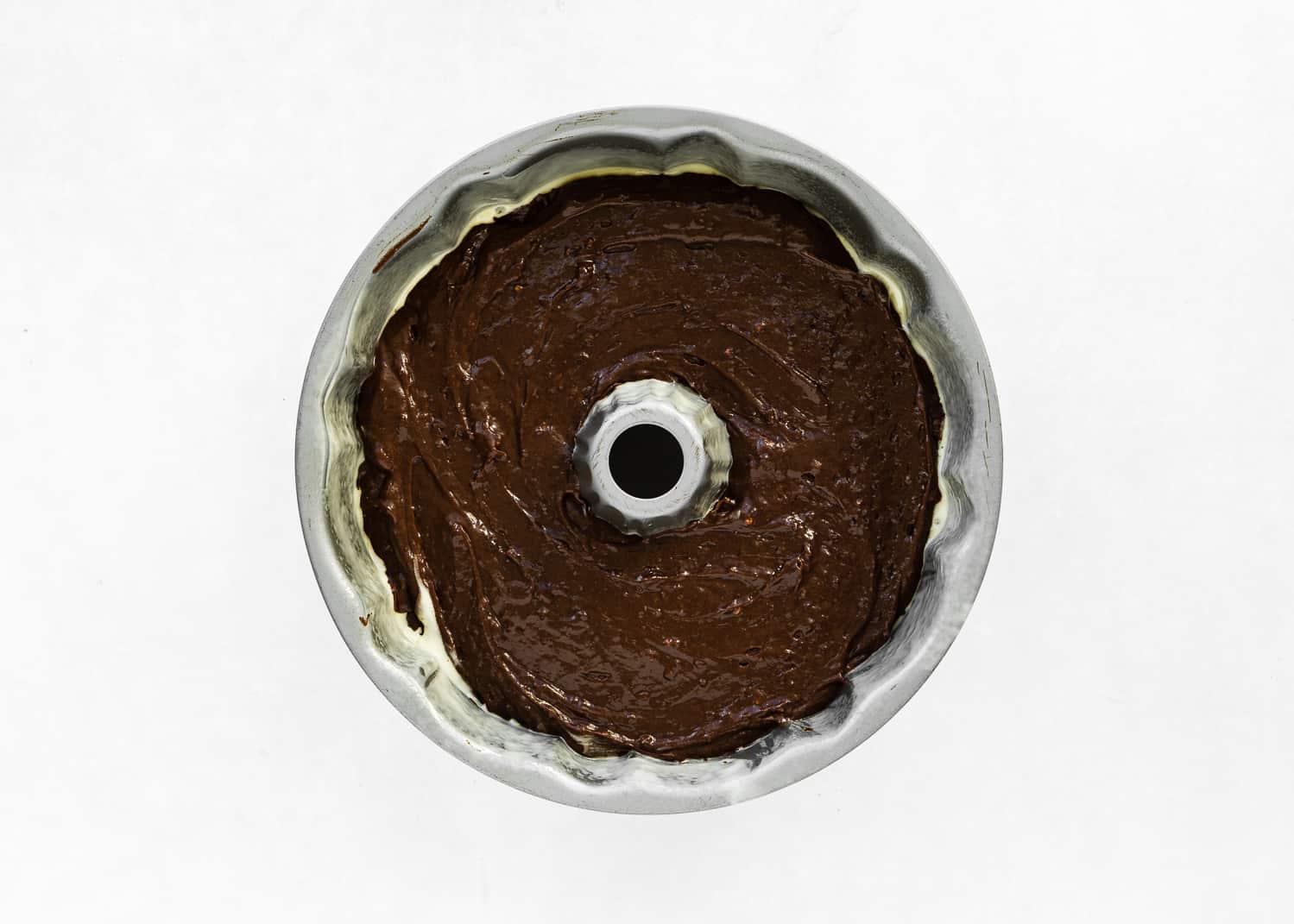 Eggless Chocolate cake batter in a Bundt Cake. 