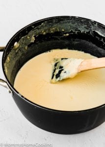 homemade evaporated milk into a pot
