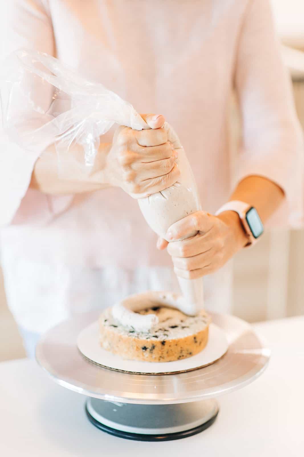 How To Stack, Fill, Crumb Coat and Frost a Layer Cake - Curly Girl Kitchen