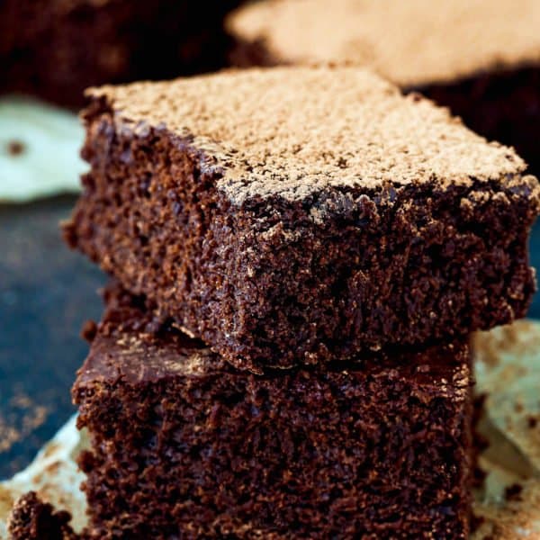 stack of two cakey brownies.
