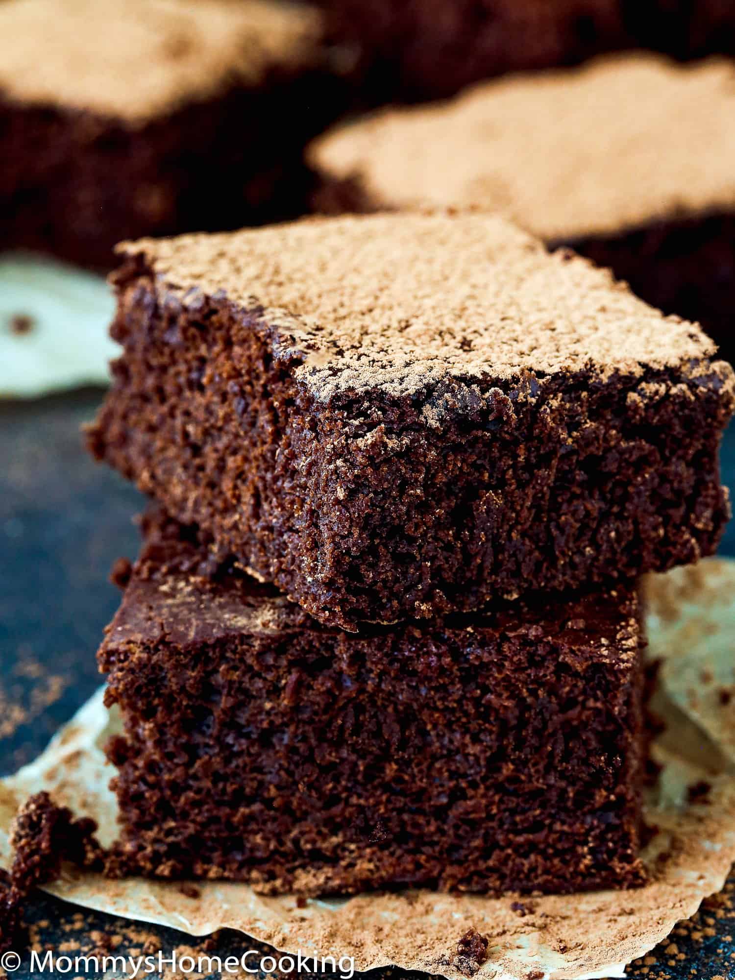 stack of two cakey brownies made with no eggs.