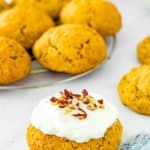 Eggless Carrot Cake Cookie with cream cheese frosting and chopped pecan on top