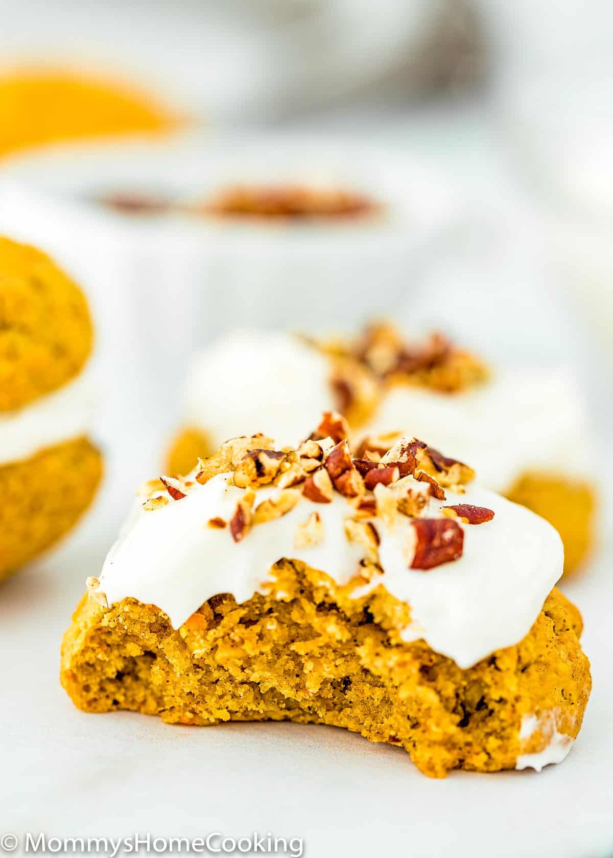 a Eggless Carrot Cake Cookie bitten showing inside texture