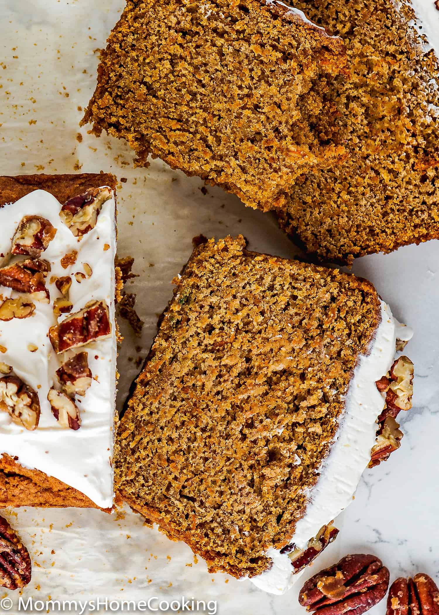 two slices if liced Eggless Carrot Cake Loaf