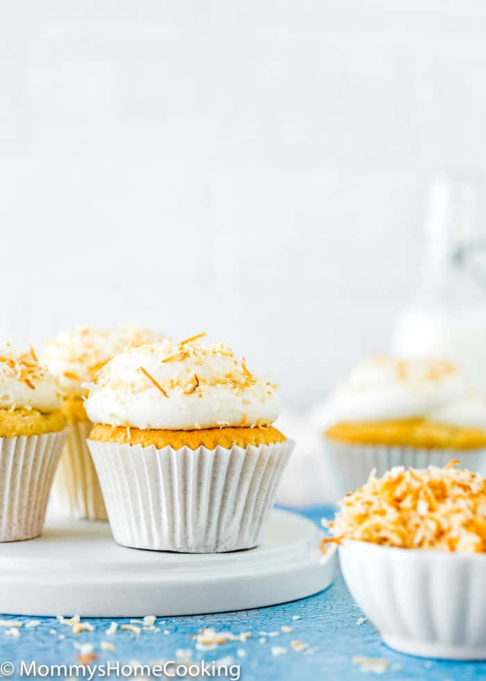 Eggless Coconut Cupcakes over a white plate