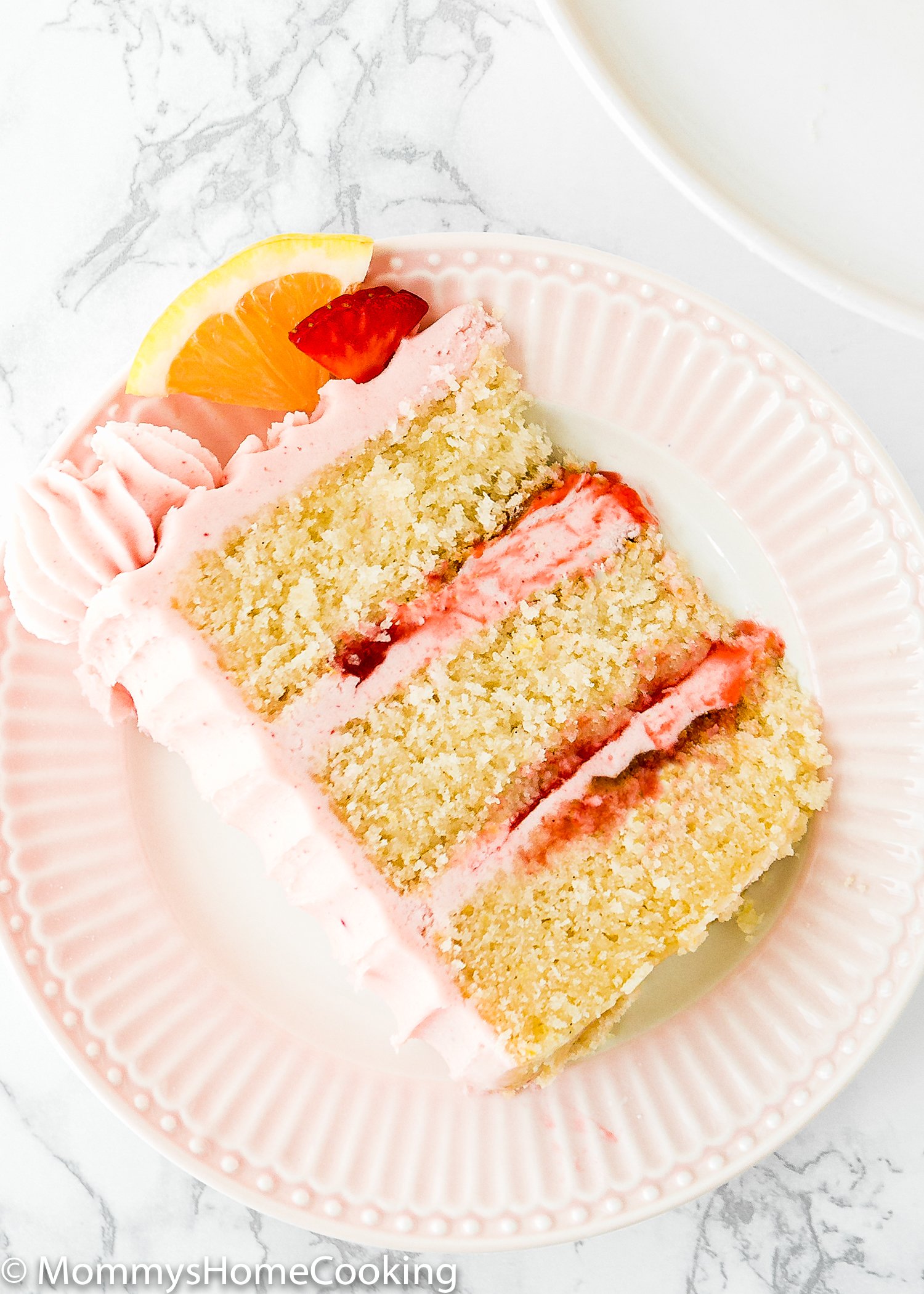 overhead view of a slice of Eggless Strawberry Lemonade Cake