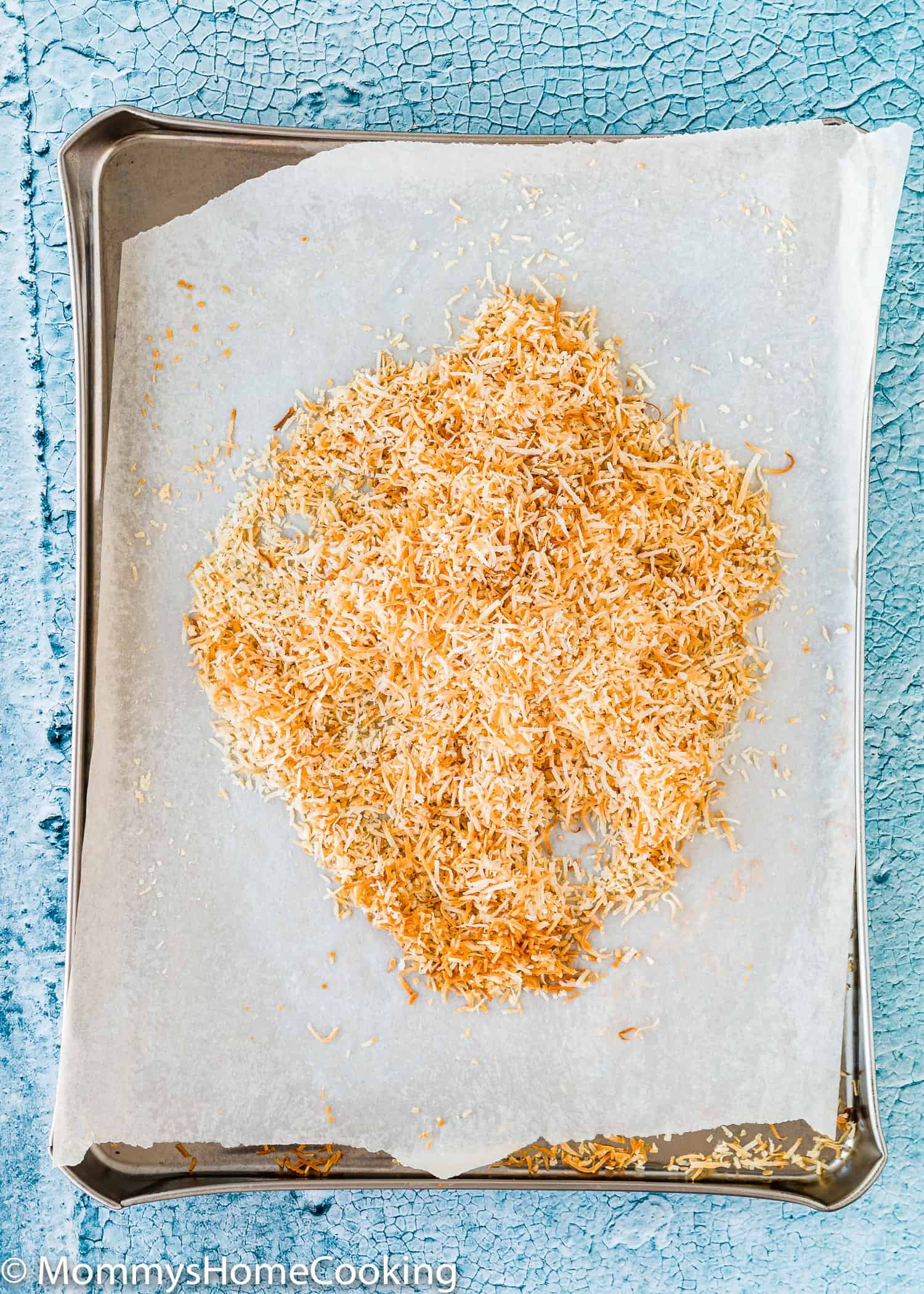 toasted coconut on a baking sheet.