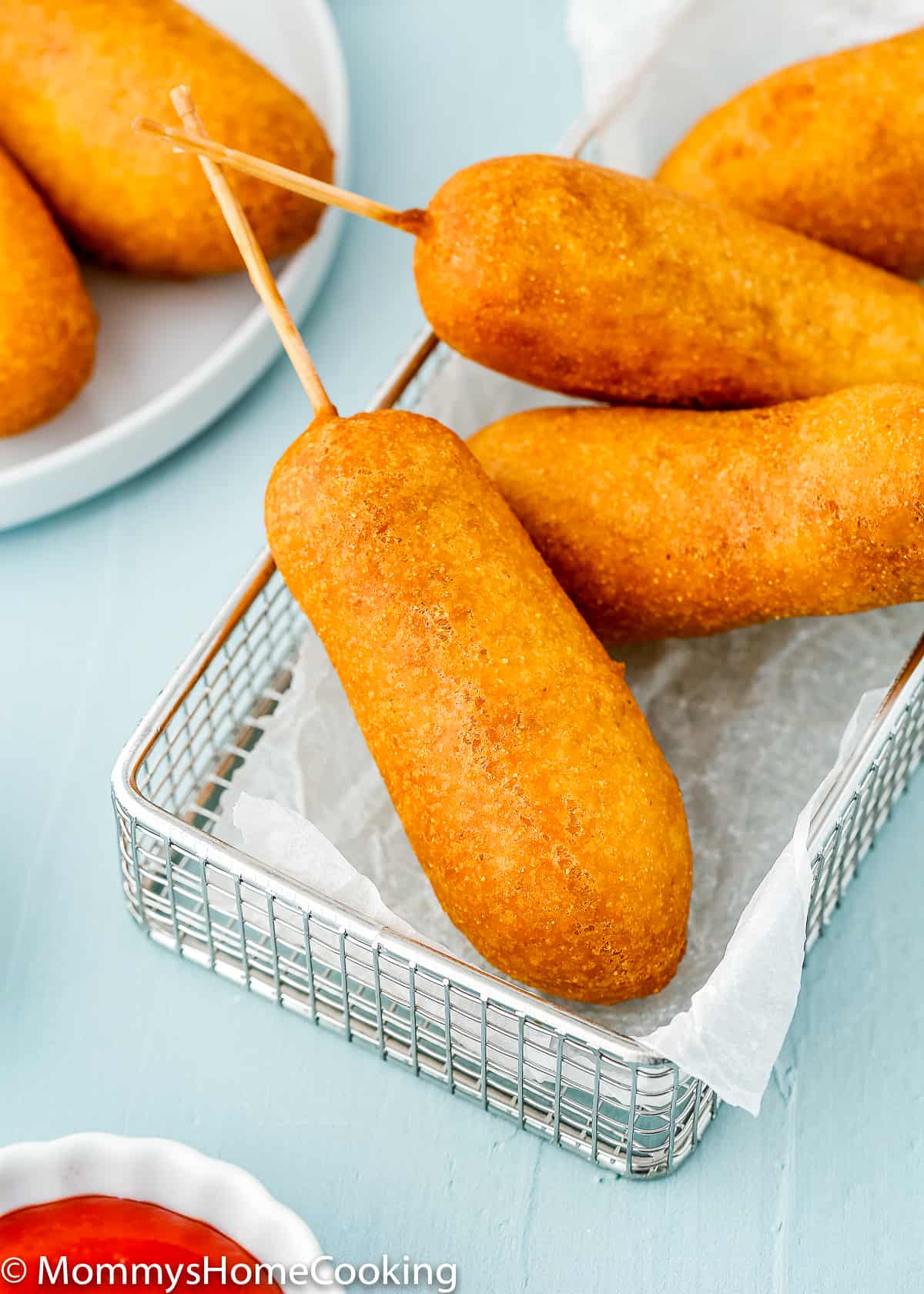 eggless homemade corndogs in a basket.