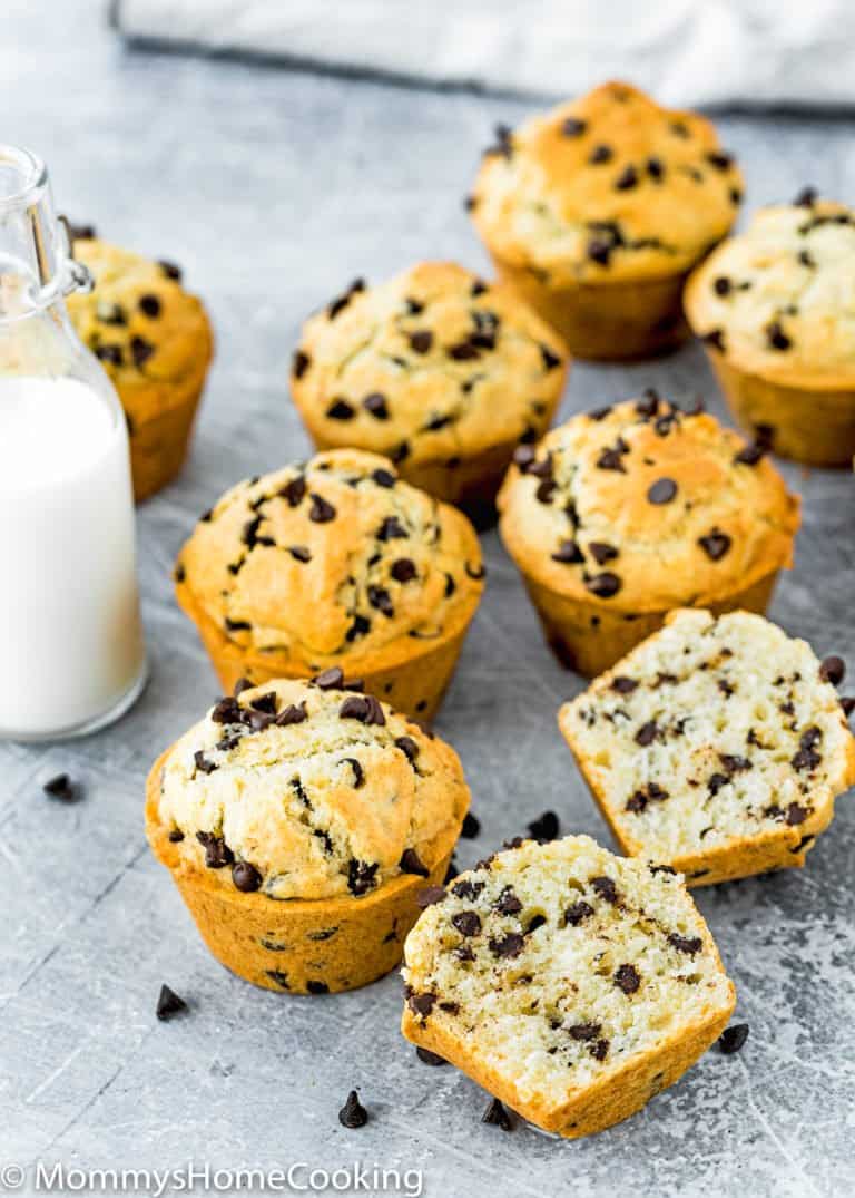 Eggless Bakery-Style Chocolate Chip Muffins with a bottle of milk