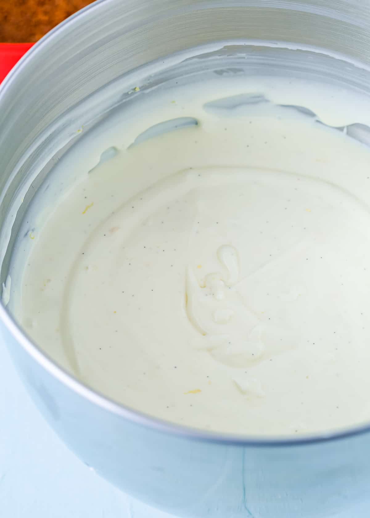 Eggless Lemon Cheesecake batter in a mixing bowl, 