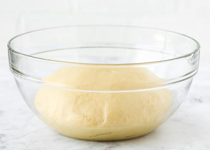 egg-free brioche dough in a bowl. 