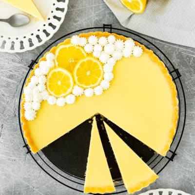 overhead view of an sliced Eggless lemon tart