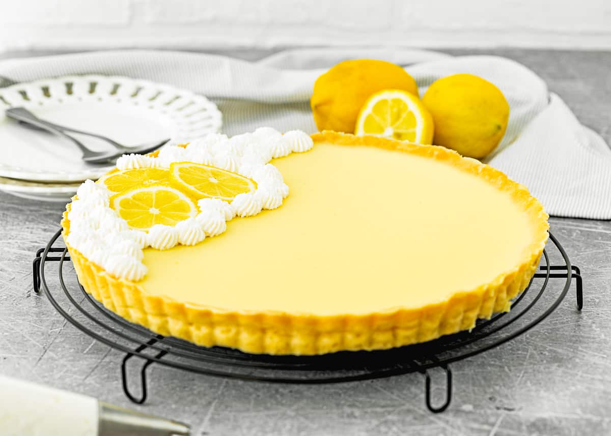 Eggless lemon tart over a cooling rack