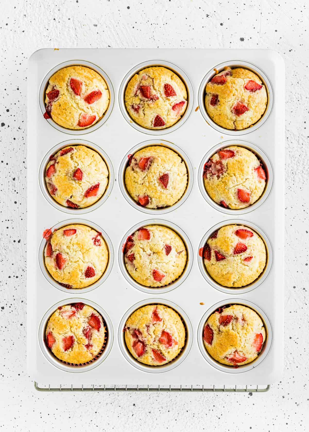 baked egg-free strawberry muffins in a muffin pan. 