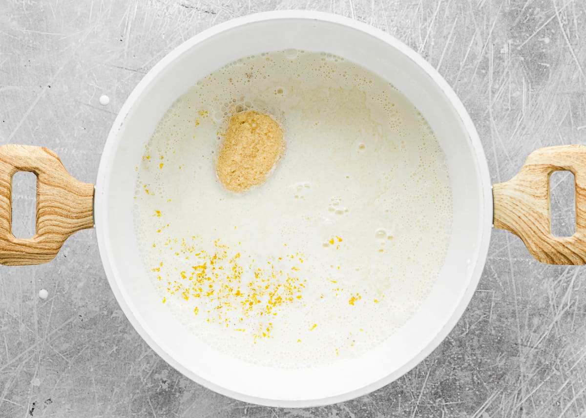 ingredients to make eggless lemon filling for tarts in a saucepan