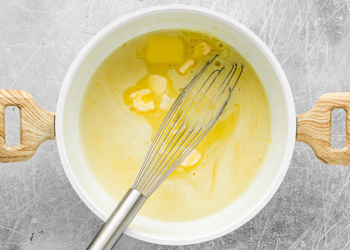 eggless lemon tart filling in a saucepan with butter